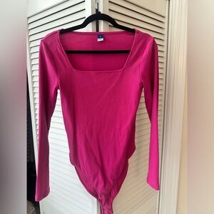 Pink long sleeve bodysuit